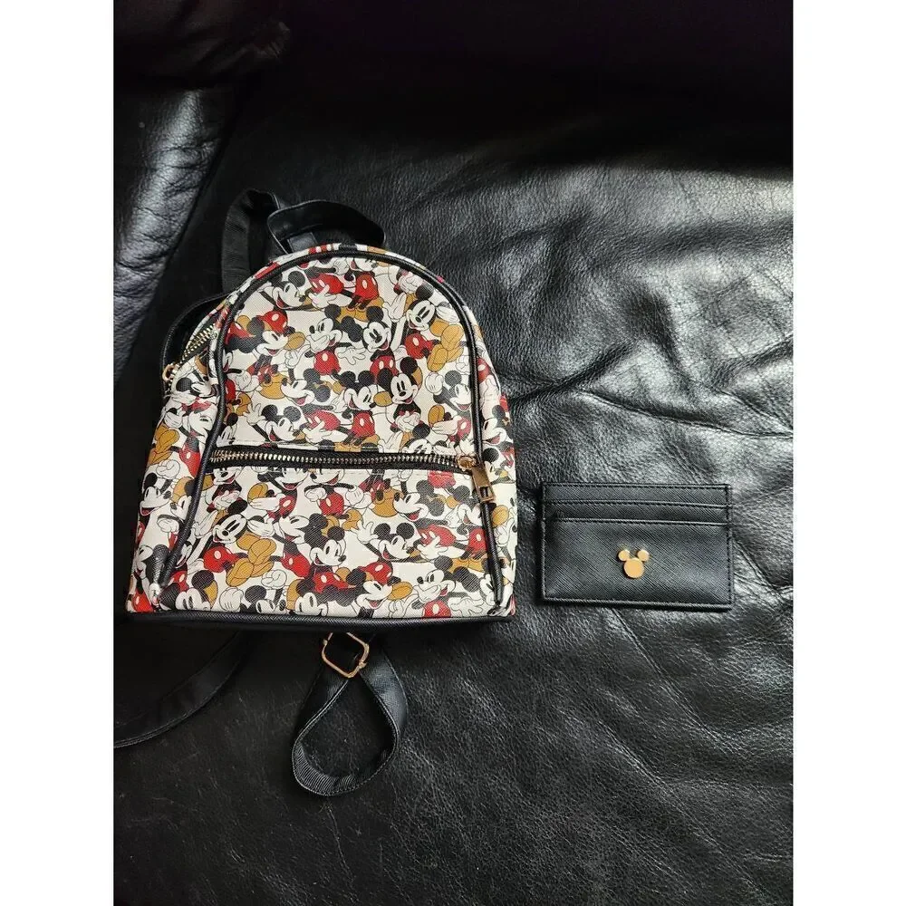 Disney Mickey Mouse backpack and matching card holder. Exterior zippered pocket